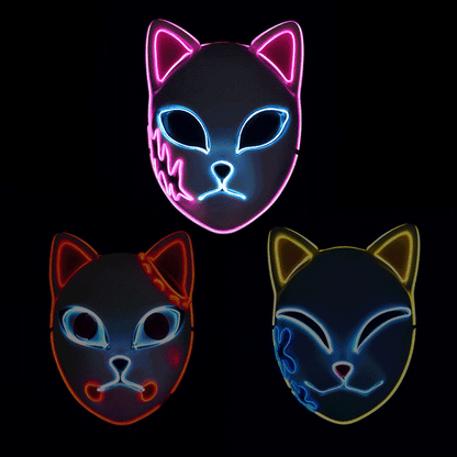 A quartet of Anime Style Cat Masks glowing with neon LED lights against a black background, demonstrating the colorful and vibrant lighting options available.