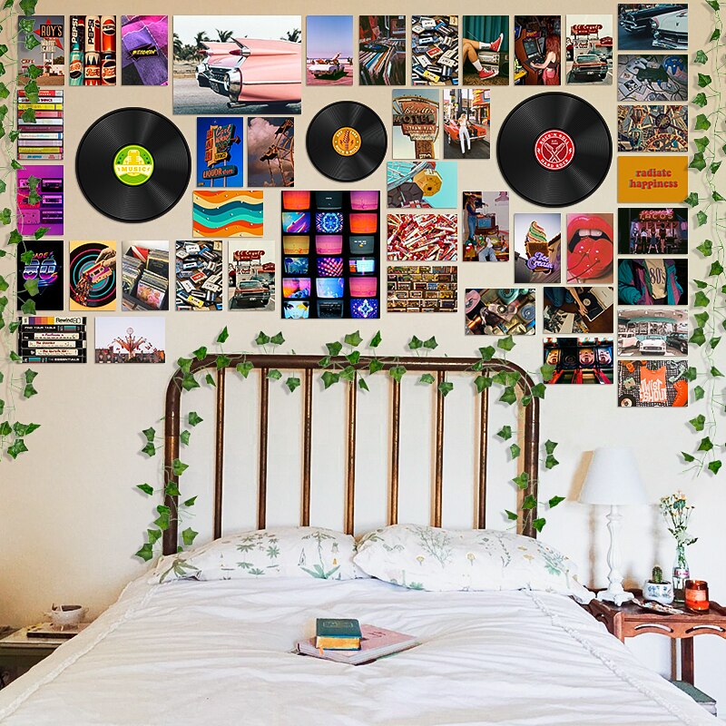A bedroom with a bed covered with white linens, surrounded by various wall decorations including vinyl records, ivy plants, a pink vintage car, colorful bookshelves, and various themed posters, creating a vibrant and retro ambiance.
