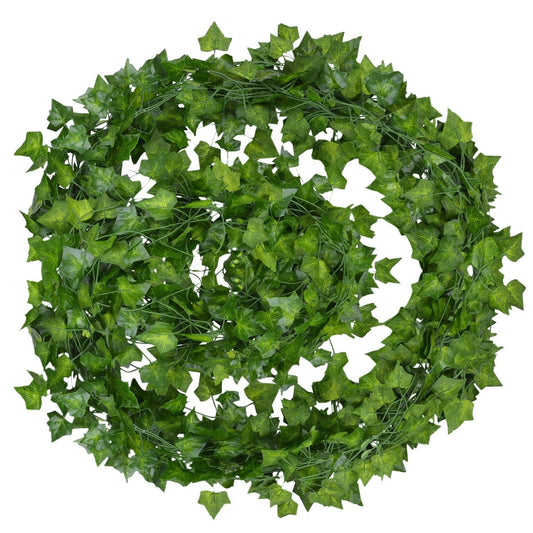A circular green ivy wreath with white butterfly accents, perfect for a cheerful room decor or as a springtime wall decor.