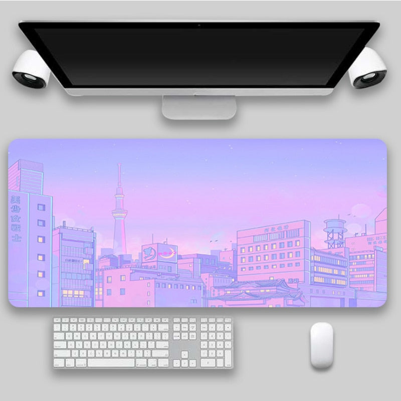 Soft pink and blue mousepad showcasing an anime-style city during the evening, complementing cottagecore bedroom or light academia decor themes.