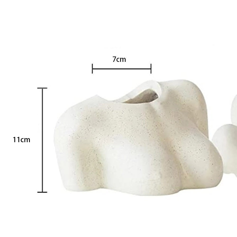 Top verison of a white ceramic vase, lying on its side with dimensions labeled showing a width of 7 cm and a height of 11 cm.