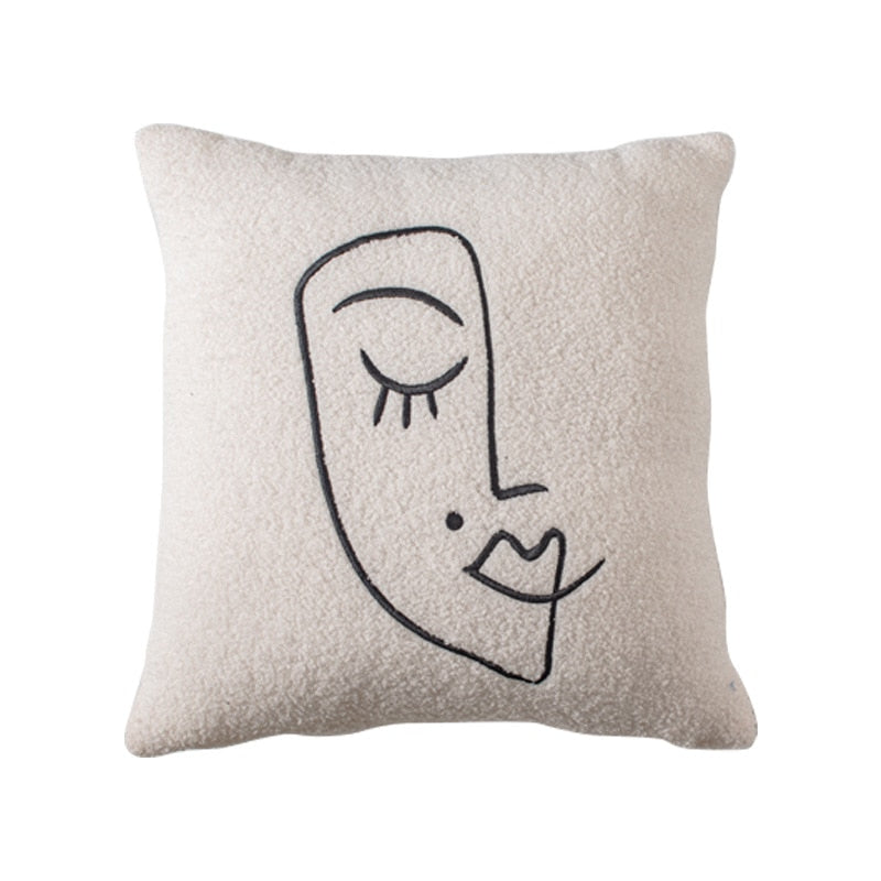 A square pillowcase in a soft cream color features a line art drawing of a face with a closed eye, long eyelashes, and elegant lips, drawn in a minimalist black outline. The pillowcase embodies the 'Art Hoe' aesthetic and would blend well with decor styles like 'Boho', 'Coquette', 'Cottagecore', 'Danish Pastel', and others. It's perfect for adding a touch of artistic flair to bedding and rooms designed with 'Dreamy', 'Feminine', and 'Relaxing' themes in mind.