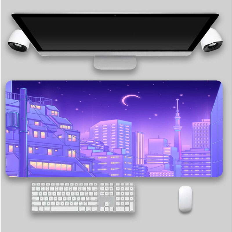An expansive mousepad with a nighttime anime cityscape and crescent moon, ideal for those curating a light academia decor or cottagecore bedroom.