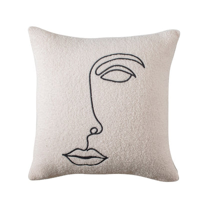 A cozy pillowcase with a rich, textured surface, displaying a single black line drawing of an abstract face with an eye, eyebrow, and lips. The artwork on the pillowcase is reminiscent of the 'Art Hoe' aesthetic and would be a fitting addition to rooms decorated in 'Boho', 'Coquette', 'Cottagecore', 'Danish Pastel', and other similar styles. It's ideal for 'Dorm Room', 'Dreamy', 'Feminine', and 'Relaxing Room' decor, offering a blend of comfort and artistic expression.
