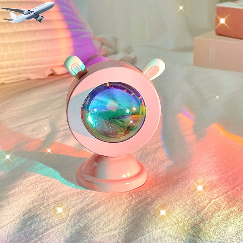 A single cat-eared sunset light projector illuminating a soft pastel bedroom, the rays catching glints on a plush toy plane, ideal for the soft-girl room and relaxing room decor collection, adding a whimsical and dreamy ambiance.