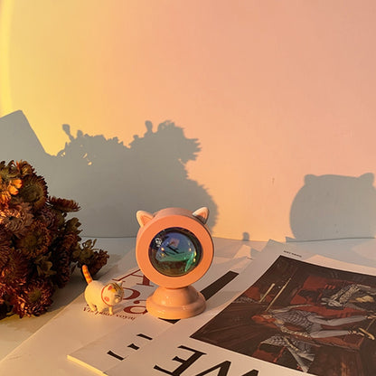 The same peach-colored Sunset Light Projector from the first image, now presenting a longer shadow play on the wall, suggesting late afternoon. It fits perfectly with the indie room and dreamy room decor collections, enhancing the warm and relaxing atmosphere.