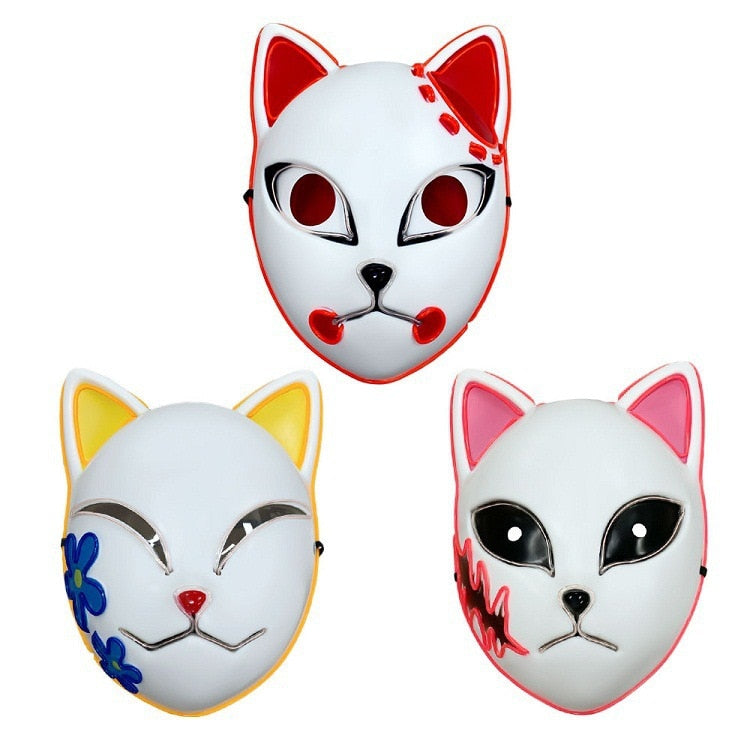 A collection of Anime Style Cat Masks, with designs in white and red, white with yellow and blue floral accents, and white with pink and black accents, all with playful facial expressions.